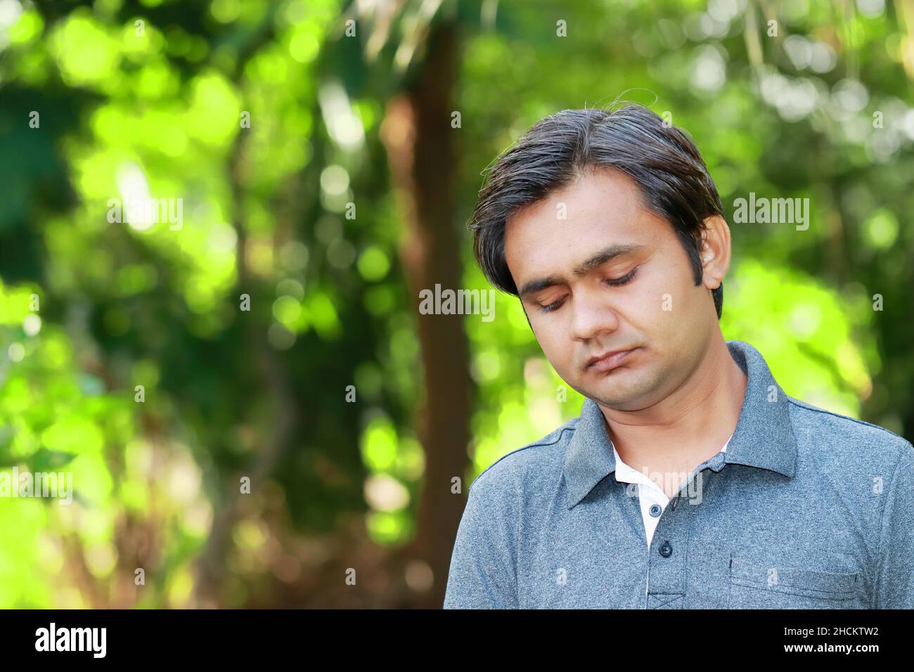 Profile of a Teenage Indian Boy Looking at outsides Stock Photo