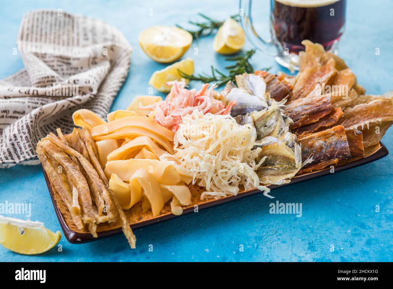 Dried Seafood Mix with Squid, Tuna, codfishon, yellow minke on Plate