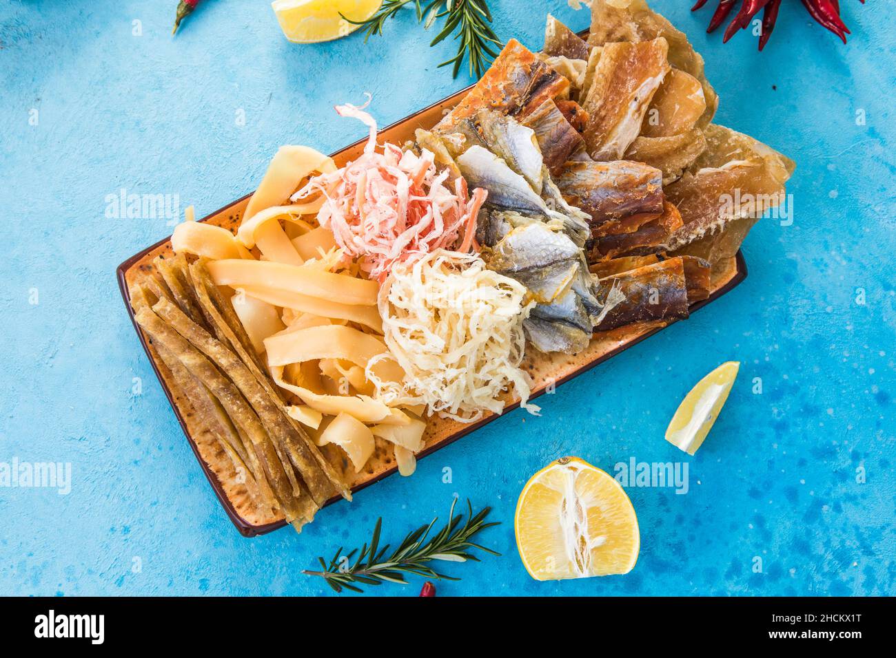 Dried Seafood Mix with Squid, Tuna, codfishon, yellow minke on Plate