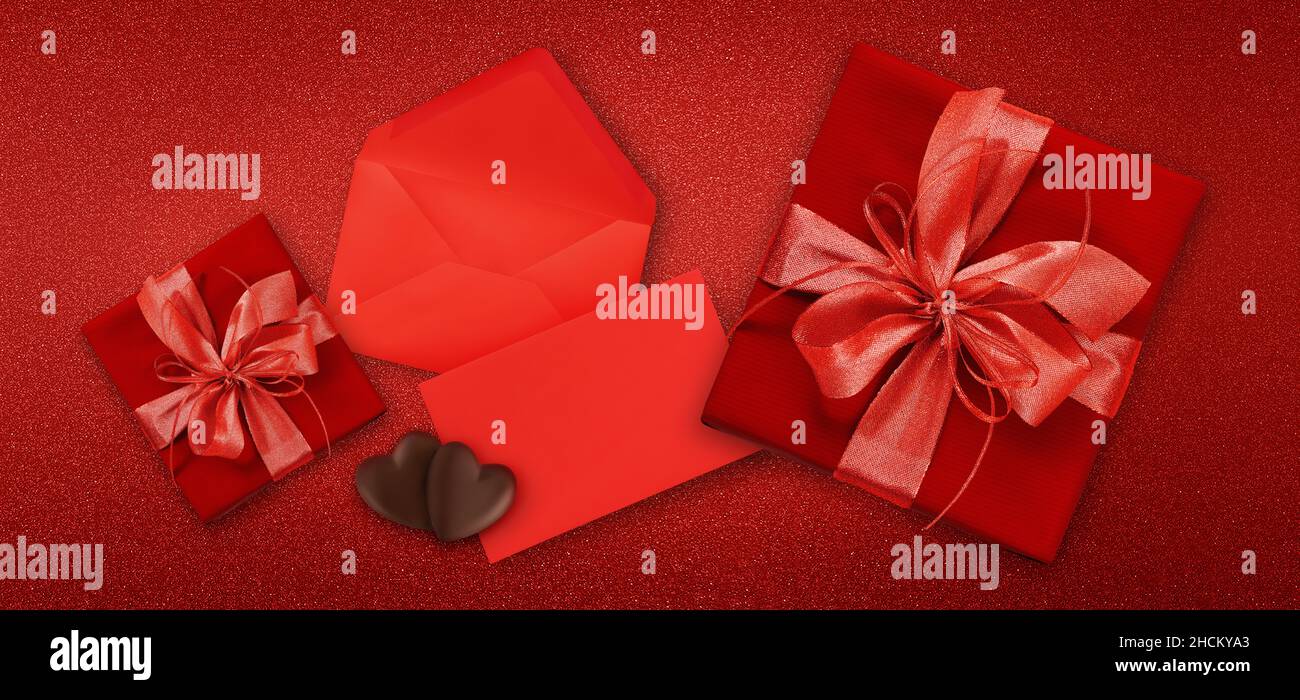 valentines day gift card, red boxes with red shiny ribbon bow, isolated ...