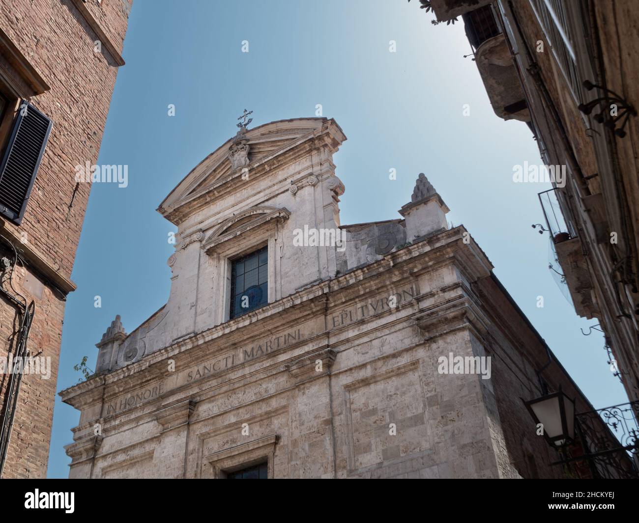 Chiesa San Martino Catholic Church in Siena, Tuscany, Italy, with inscription 'in honor of Saint Martin of Tours' Stock Photo