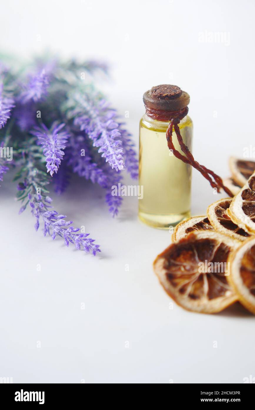 Essential lavender oil and flowers on table with copy space Stock Photo ...