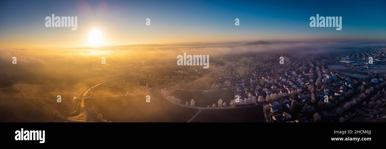 Aerial top view of a frosty landscape with sunset Stock Photo