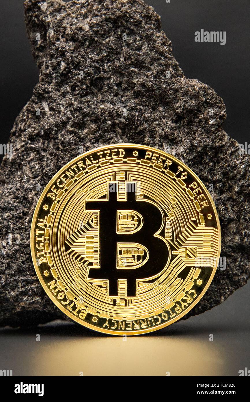 Bitcoin in ore Cryptocurrency , Mining golden coin , Stone ore mine ,  future money Stock Photo - Alamy