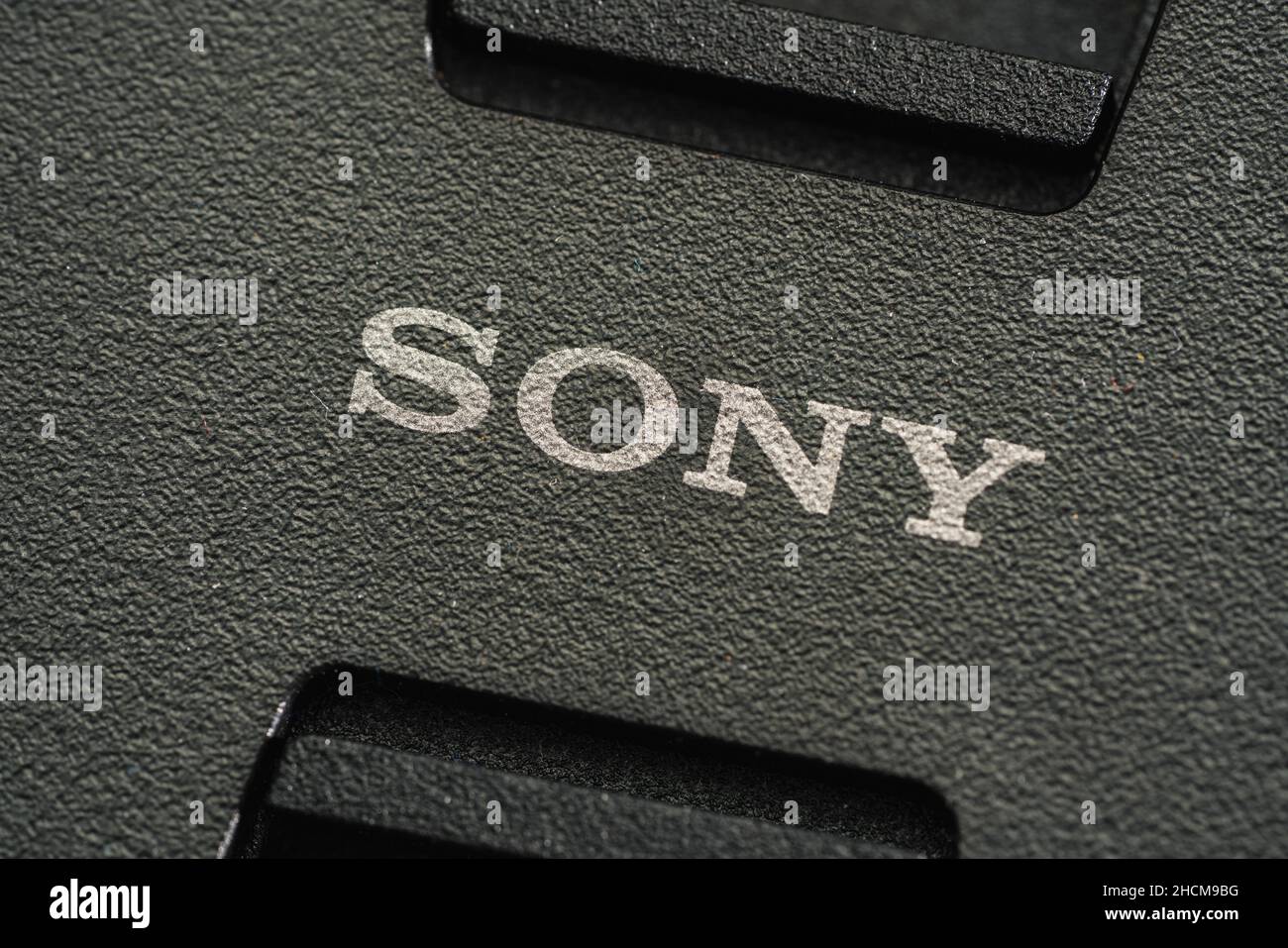 Sony logo on a lens cap. Sony is a Japanese multinational company that manufactures electronic products. Its headquarters are in Tokyo, Japan. Stock Photo