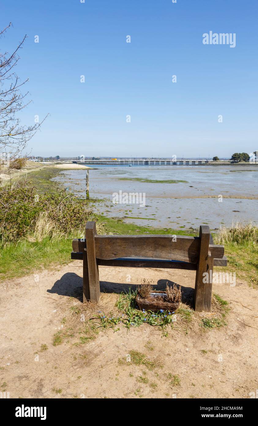 Wooden bench overlooking Chichester Harbour and the Langstone Road