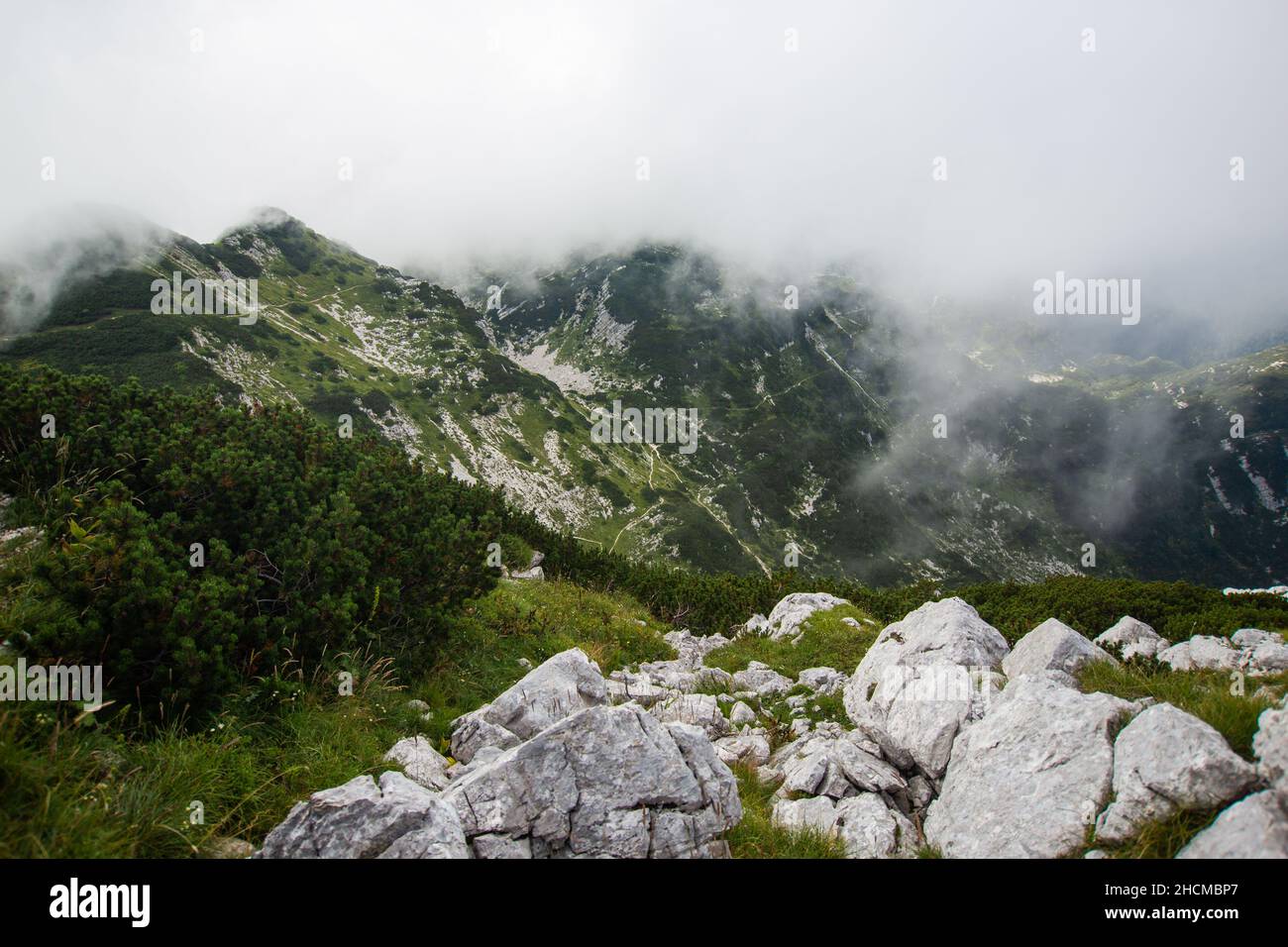 Beautiful view of misty clouds near the Triglav Mountains in Slovenia Stock Photo