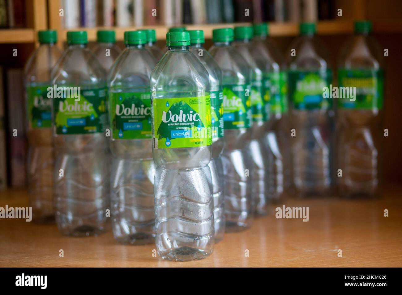 Empty recyclable Volvic water bottles ready for return to the shop