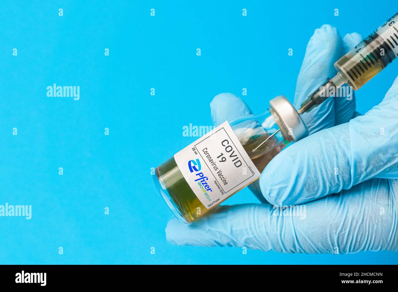 Izmir, Turkey - November 18 2020: Coronavirus vaccine concept and background. New vaccine pfizer and biontech isolated on blue background. Covid-19, 2 Stock Photo
