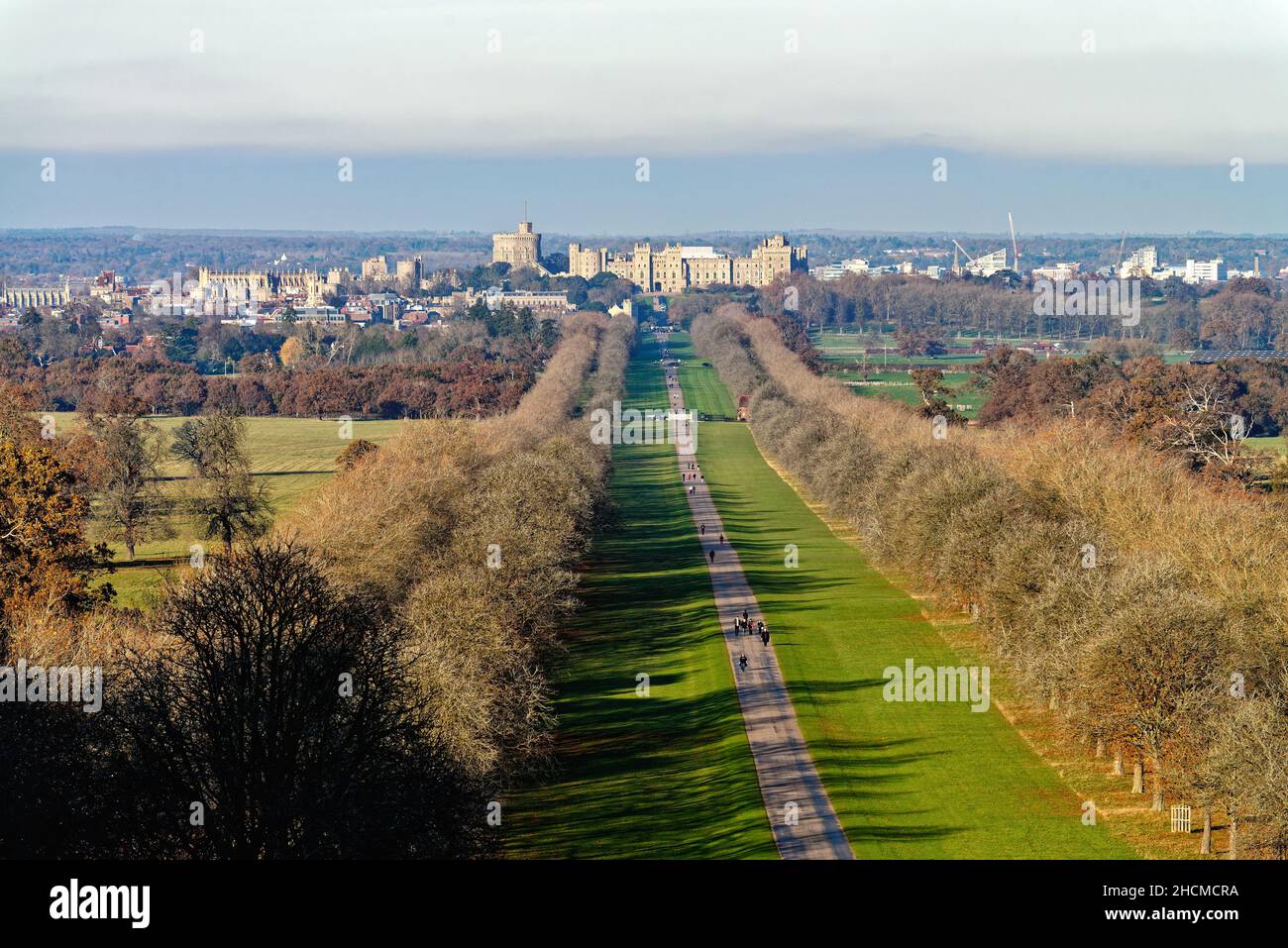 The Long Walk looking towards Windsor Castle viewed from Snow Hill on a sunny winters day, Windsor Great Park  Berkshire England UK Stock Photo