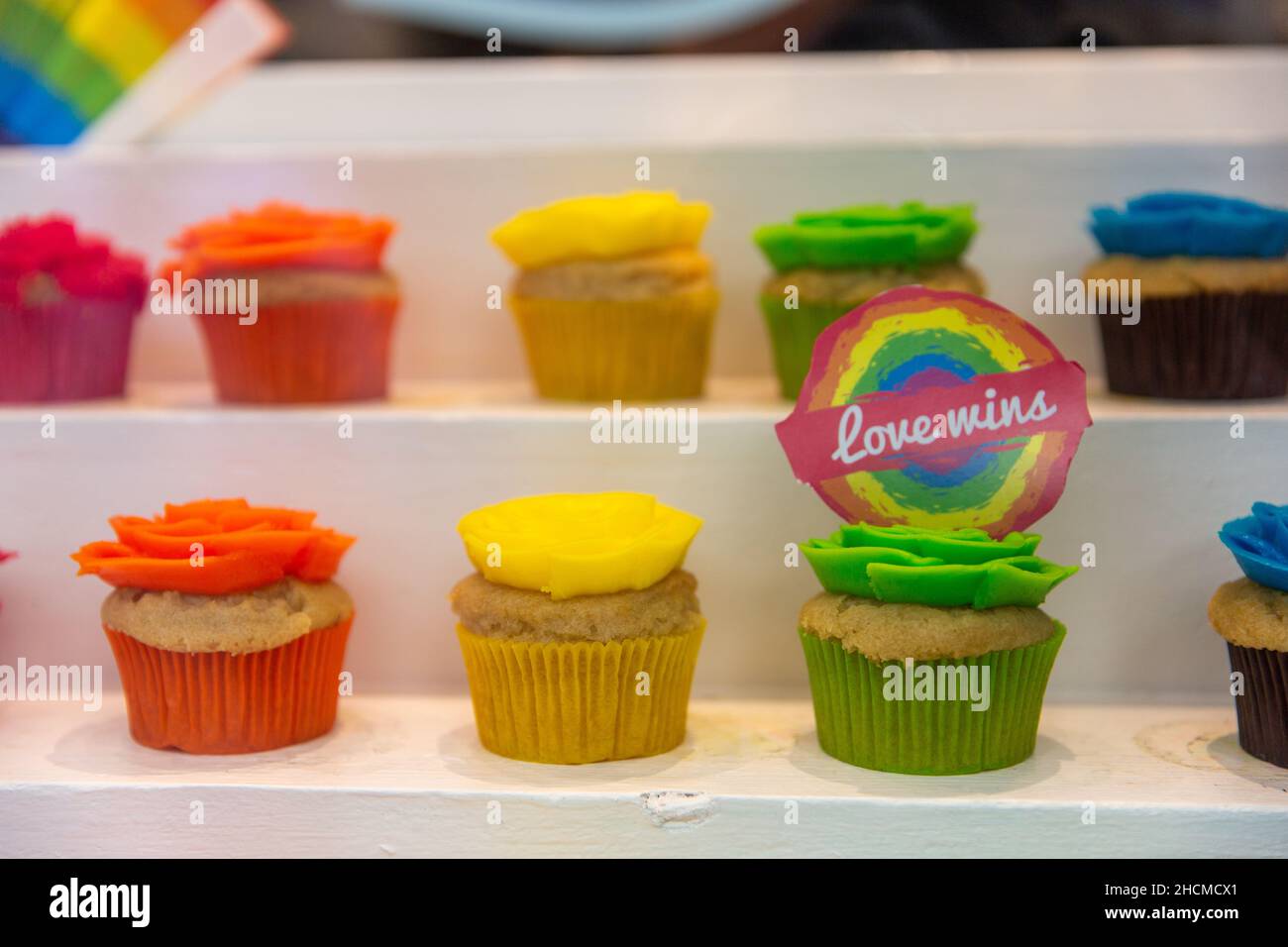 Multi-colored cupcakes for St. Valentine's Day; Love wins Stock Photo