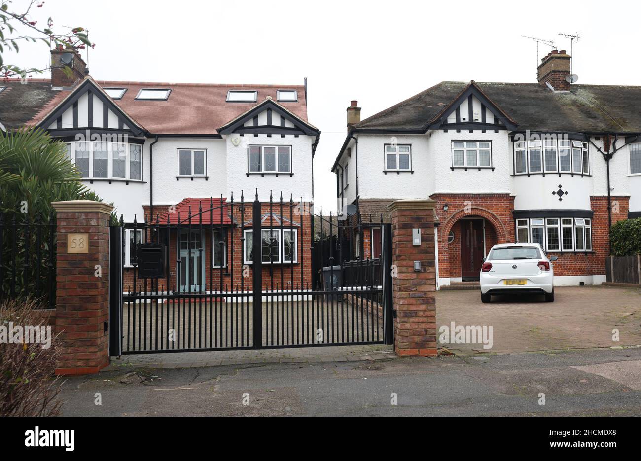 NOTE TO EDITORS The accused no longer live in the property on the left