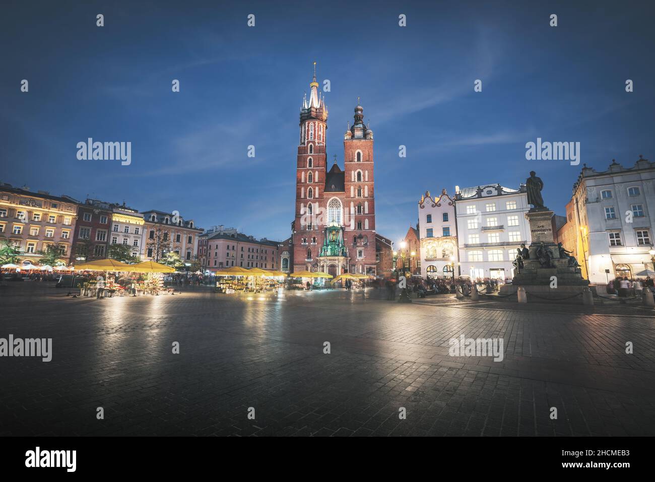 St. Mary's Basilica and Main Market Square at night - Krakow, Poland Stock Photo