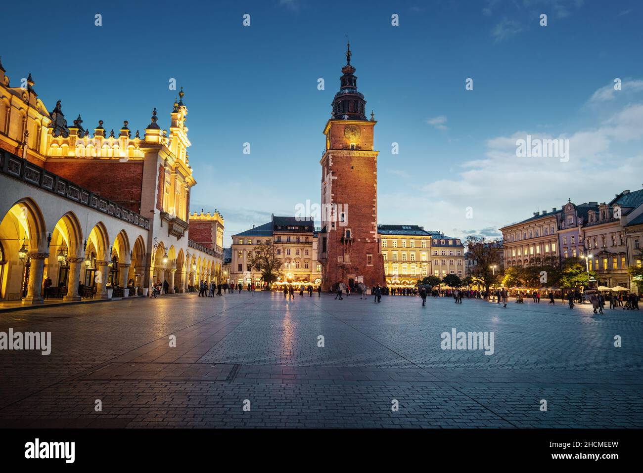 Town Hall Tower and Cloth Hall at Main Market Square at night - Krakow, Poland Stock Photo