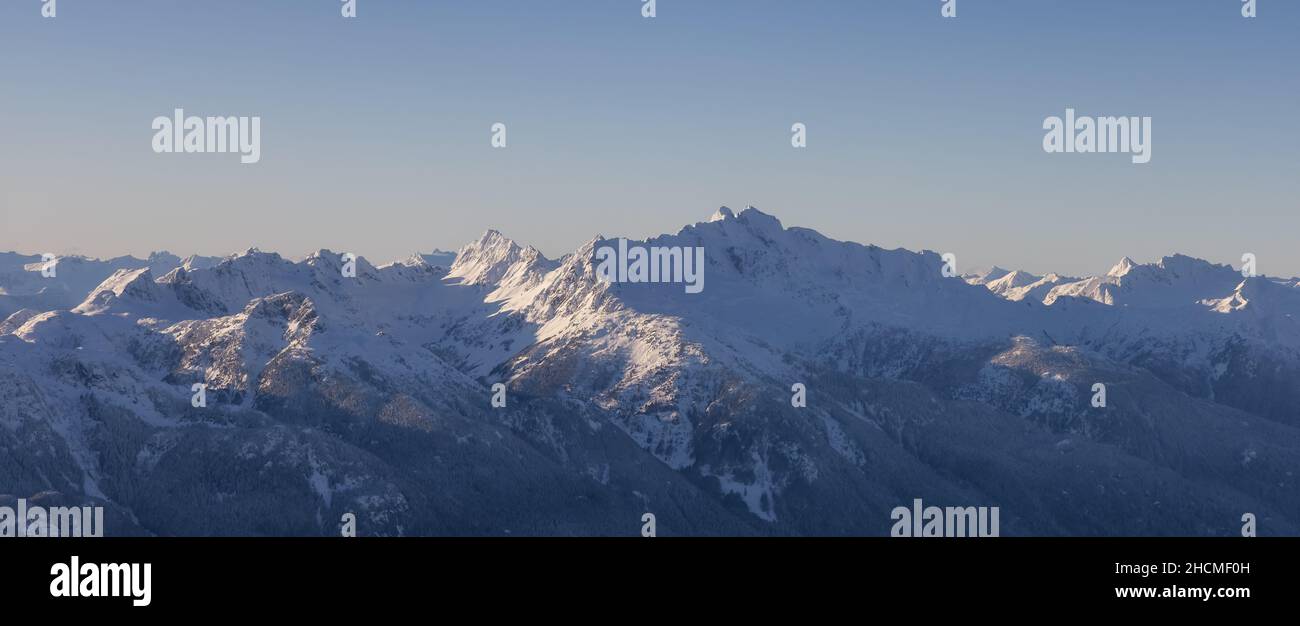 Aerial Panoramic View of Canadian Mountain covered in snow Stock Photo ...