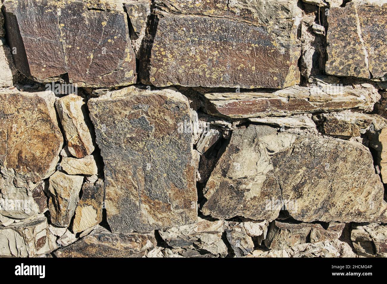 Closeup of the wall of a medieval castle of Aljezur, Portugal. Pattern of background texture. Stock Photo