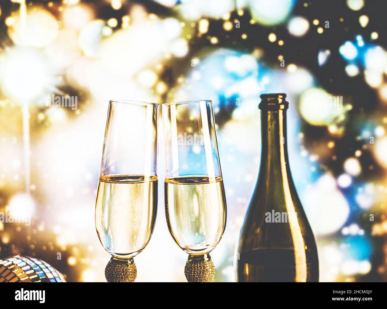 Two champagne glasses ready to bring in the New Year Stock Photo - Alamy