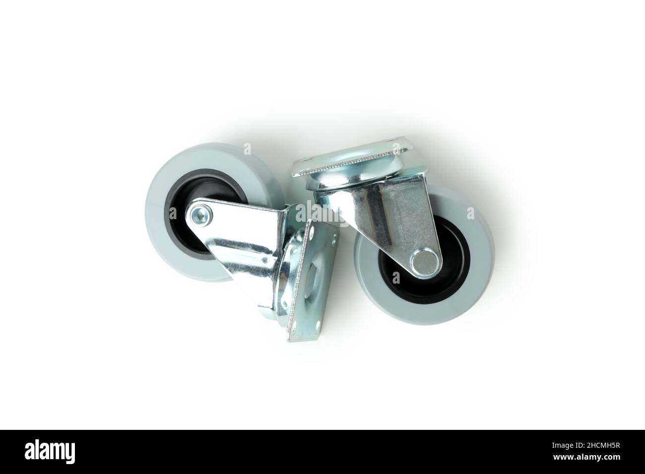 Trolley wheels isolated on white background, close up Stock Photo - Alamy