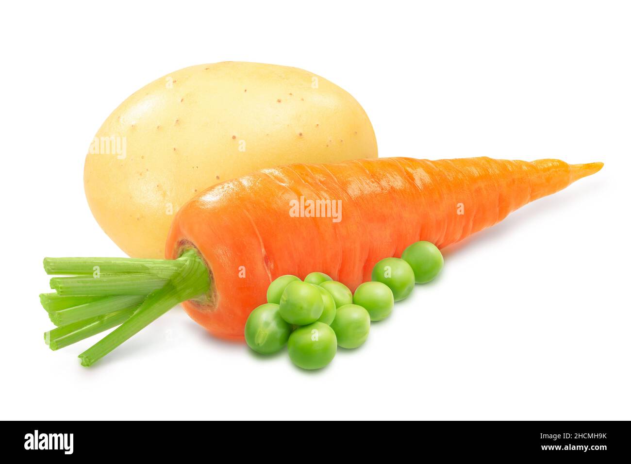Whole washed carrot with potato and sweet pea seeds isolated Stock Photo