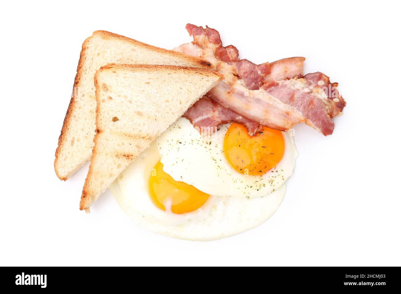 Fried eggs, bacon and toasts isolated on white background Stock Photo ...
