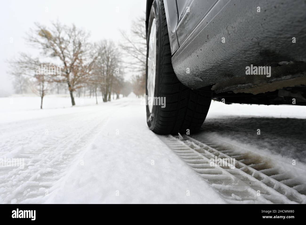 Car tire track in the snow. Concept for transport and winter tires in ...