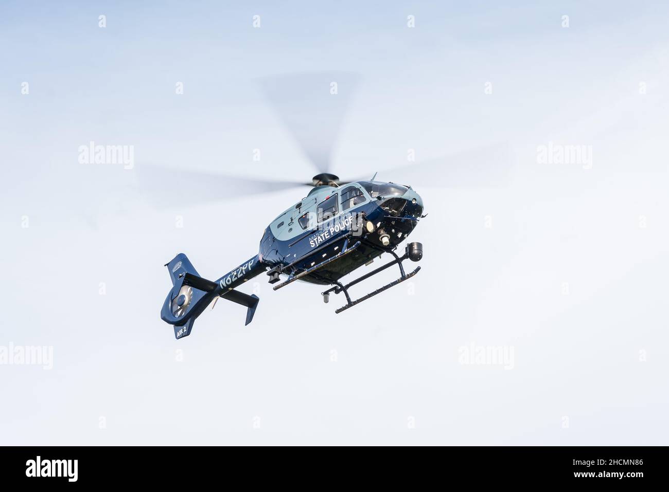 Helicopter from the Massachusetts State Police Air Wing flying Stock