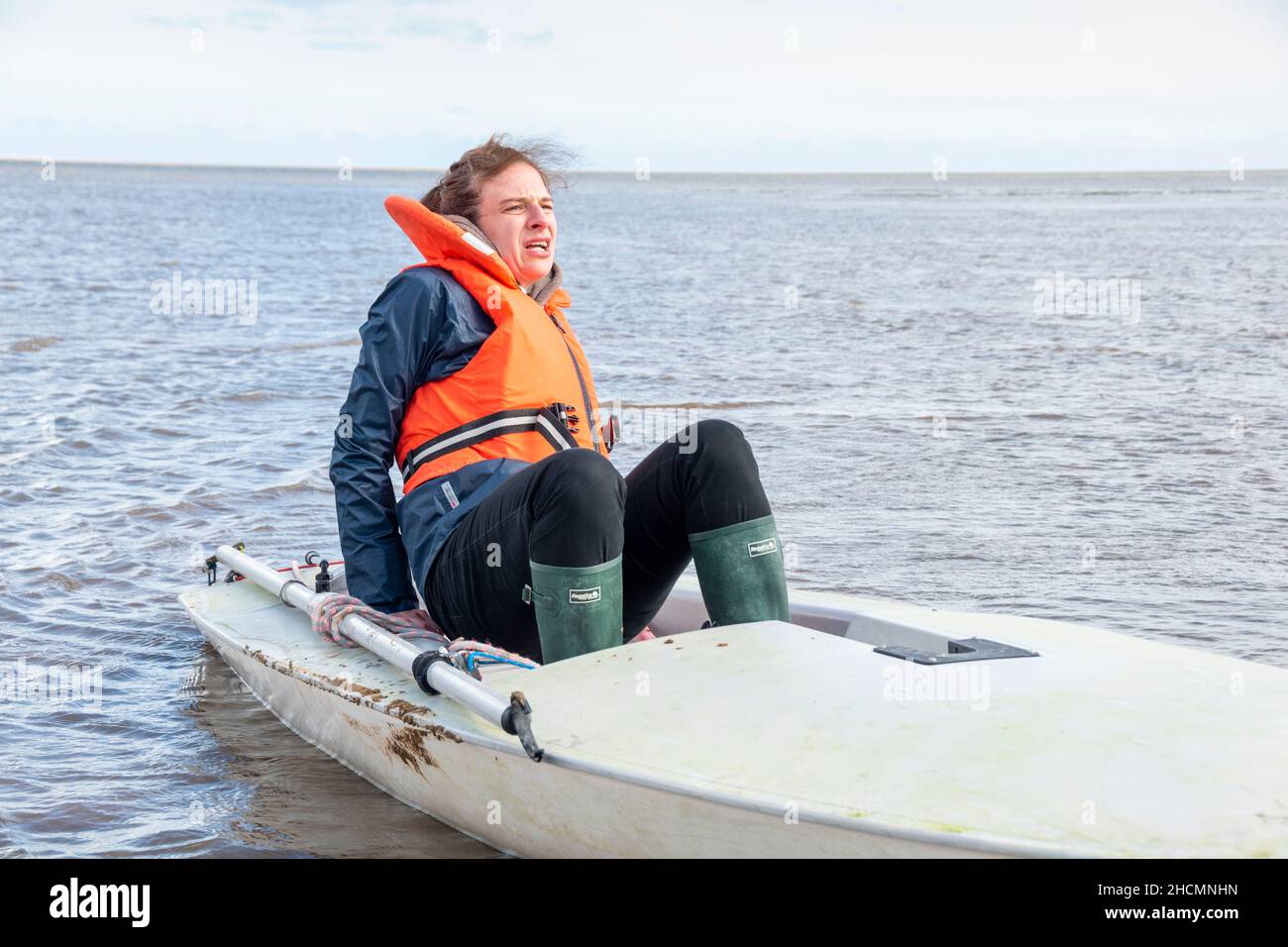 Lincolnshire, UK – 14 Sept 2017 : Anca Nana Vaida yelps as water leaks into her boat on location filming Taking to the Boats by Wellred Films, Cleetho Stock Photo