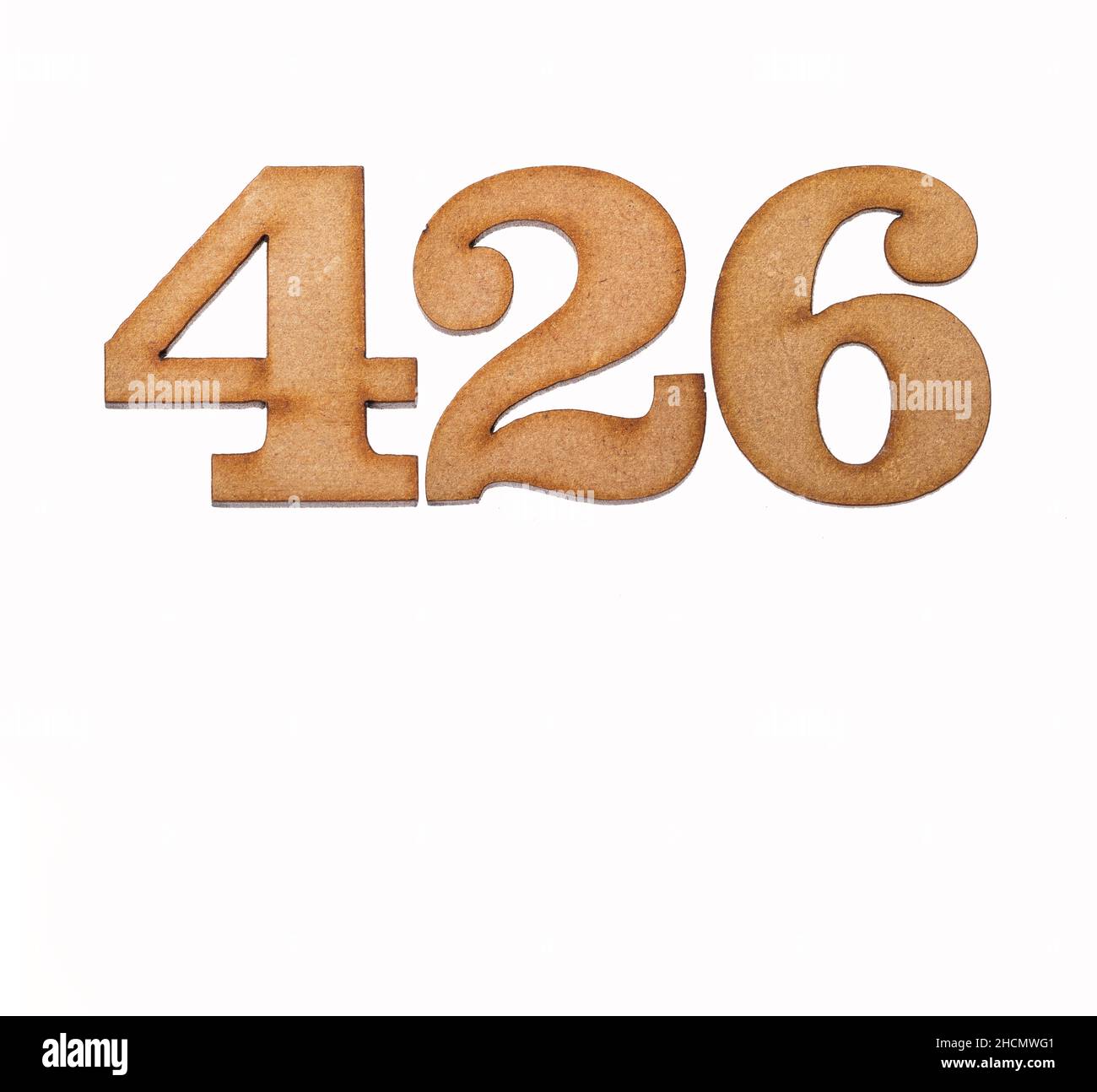 Number 426 in wood, isolated on white background Stock Photo - Alamy