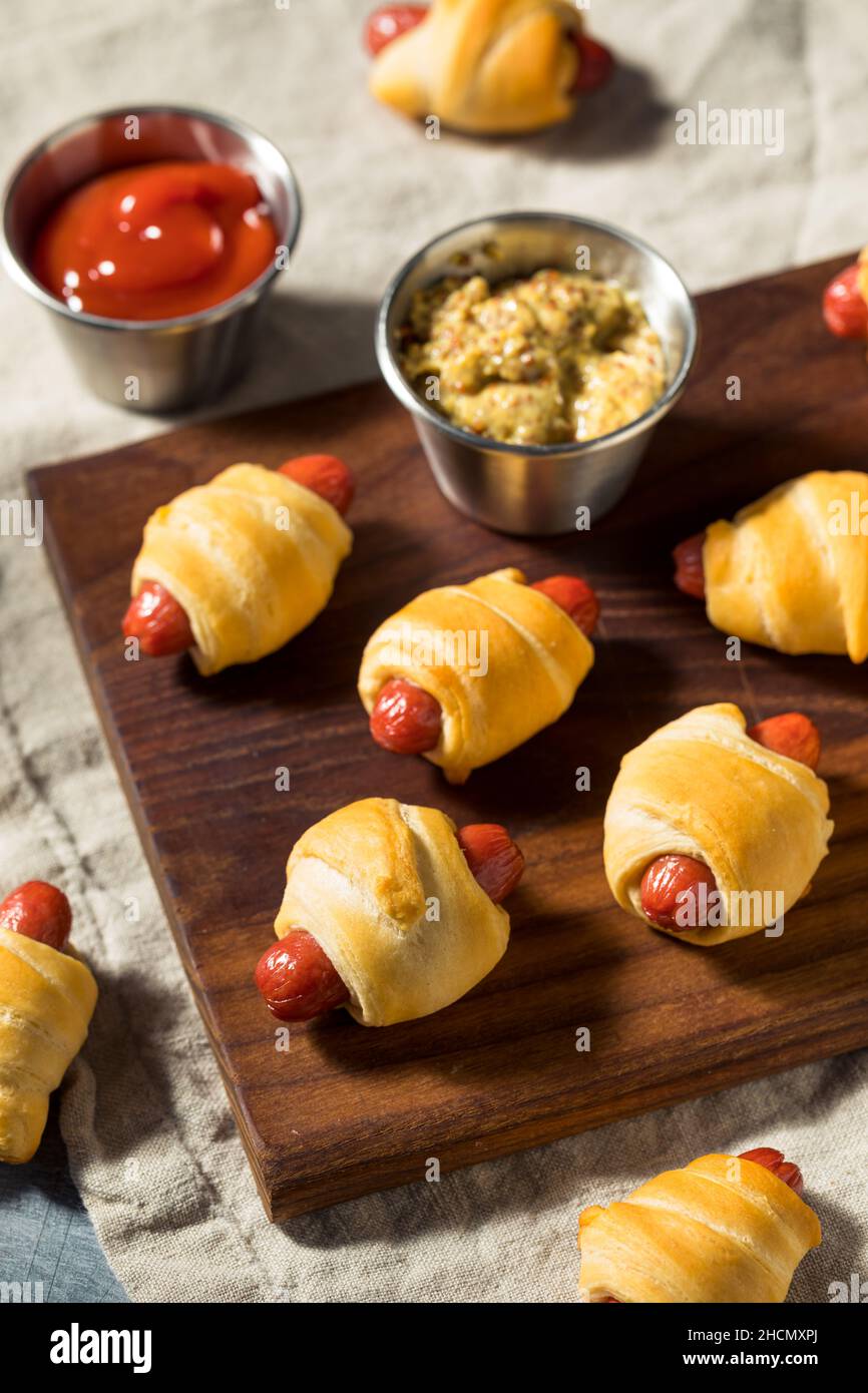 Homemade Pigs in a Blanket with Mustard and Ketchup Stock Photo Alamy