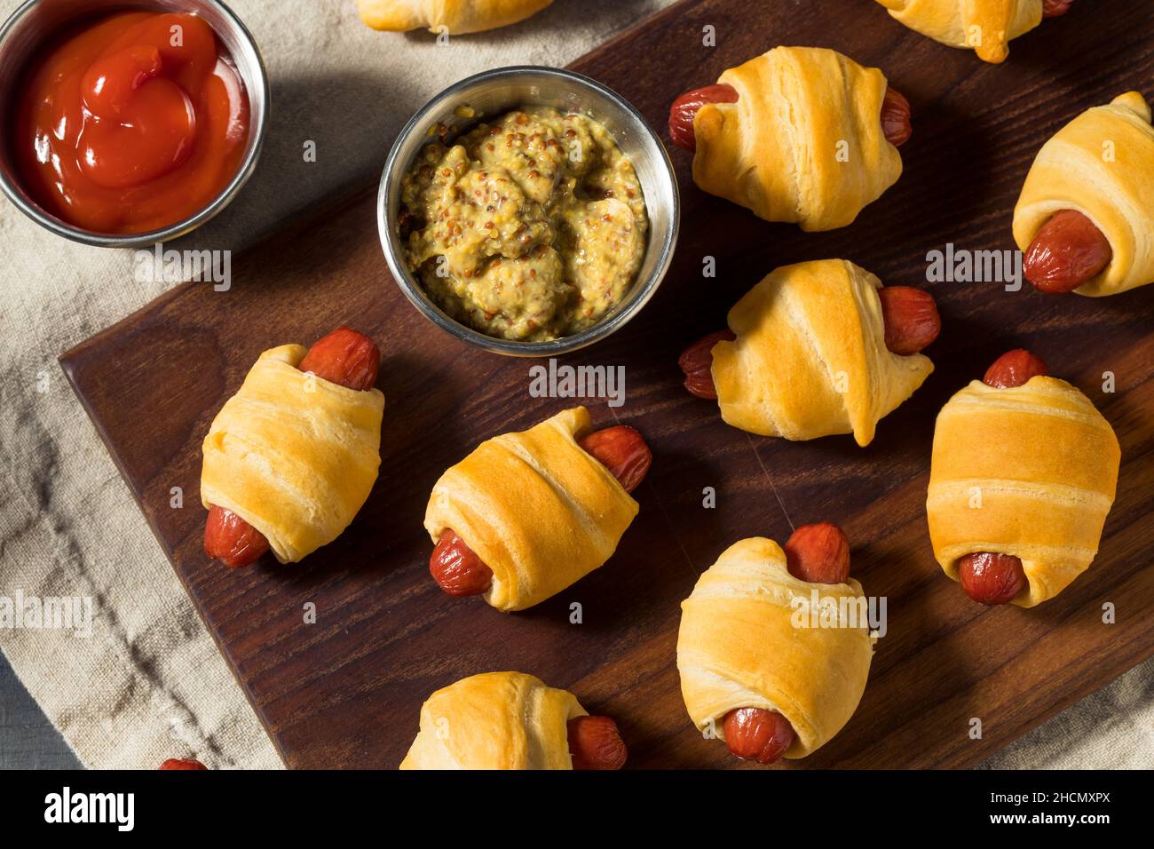 Homemade Pigs in a Blanket with Mustard and Ketchup Stock Photo Alamy