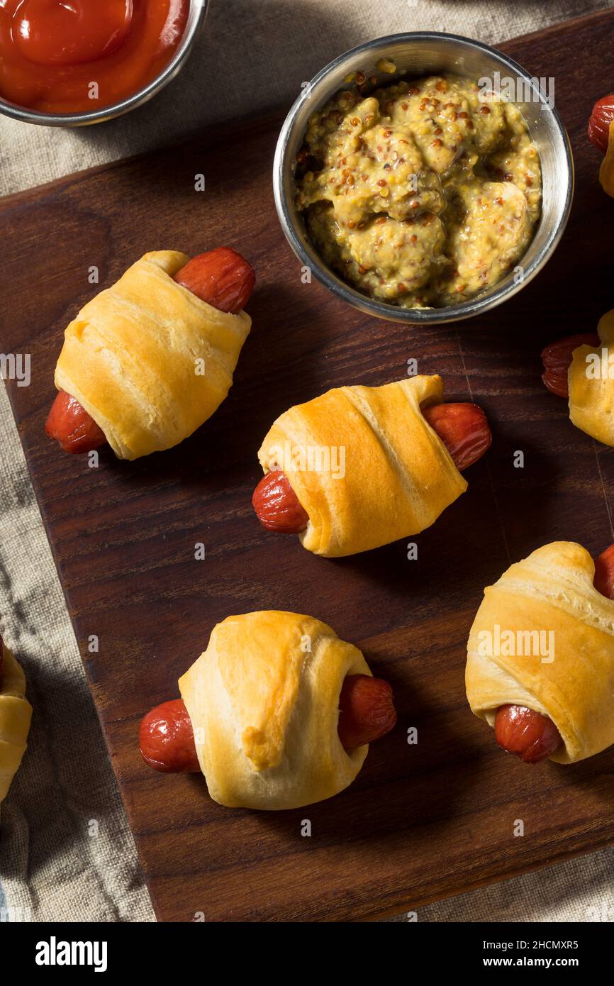 Homemade Pigs in a Blanket with Mustard and Ketchup Stock Photo Alamy