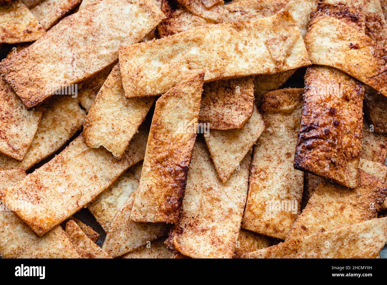 Freshly Baked Cinnamon Sugar Tortilla Chips Snack Food A pile of crispy baked cinnamon sugar