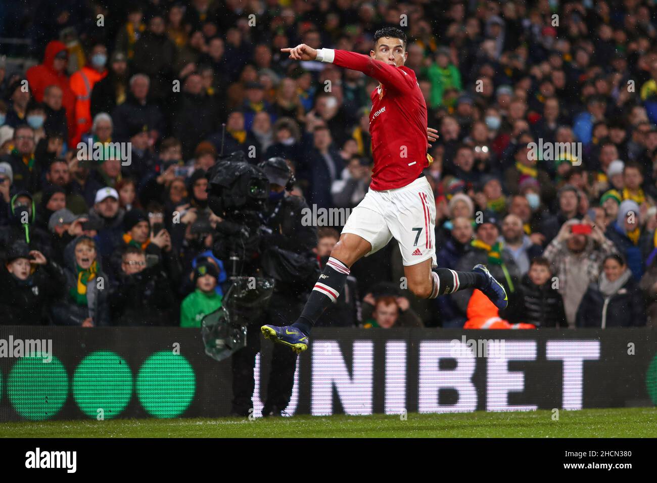 Norwich, UK. 11th Dec, 2021. Cristiano Ronaldo of Manchester United scores  the only goal of the game from the penalty spot during the Premier League  match between Norwich City and Manchester United