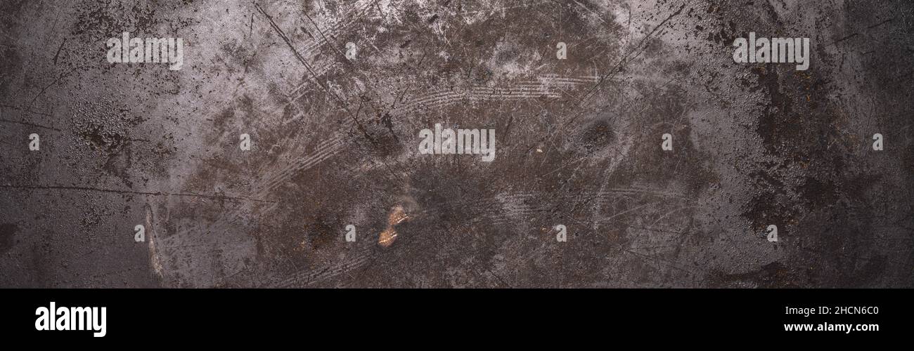 dark weathered rusty metal background texture or backdrop, banner size Stock Photo