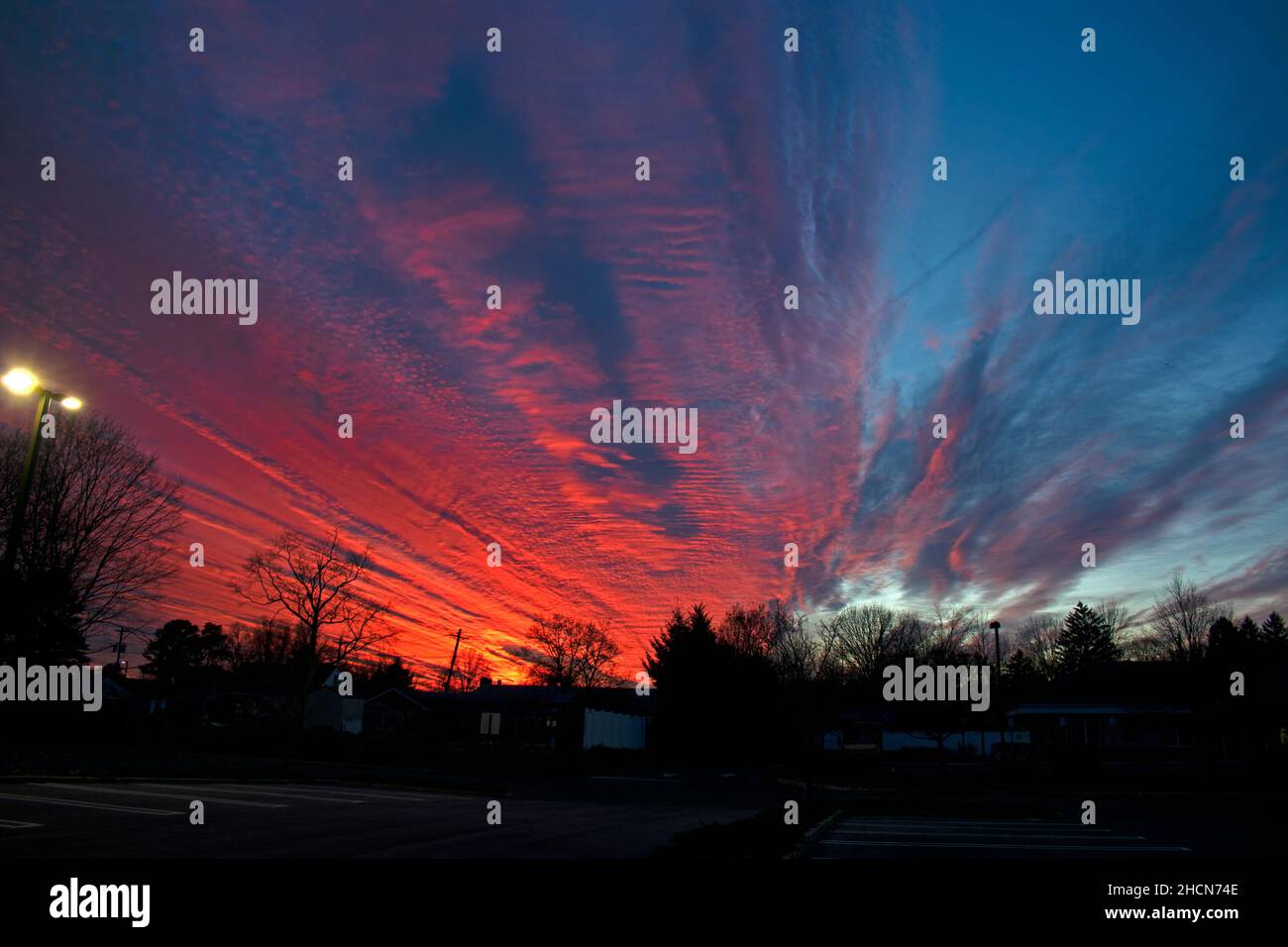 Spectacurar, multi colored sunset in Easy Brunswick, New Jersey, with plenty of stratus cloud coverage -01 Stock Photo