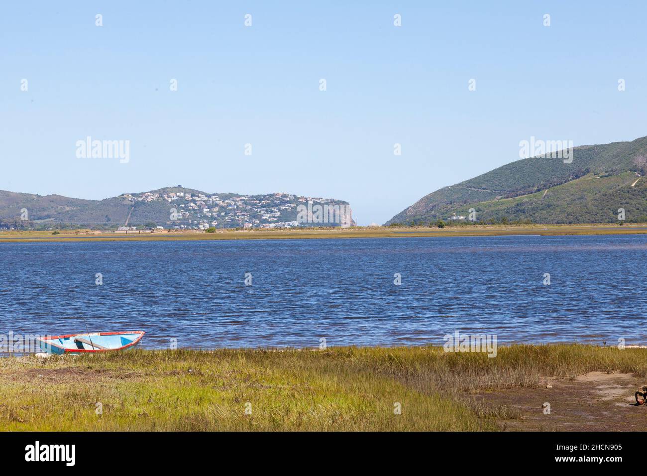 View over the Knysna Lagoon of the popular tourist town of Knysna, Garden Route, Western Cape, South Africa with The Heads Stock Photo