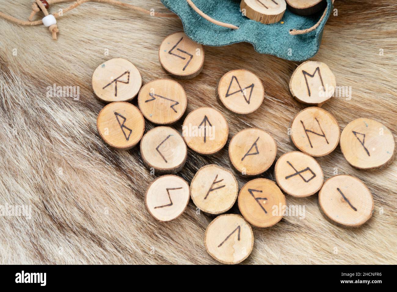 Handmade runes for fortunetelling Stock Photo - Alamy