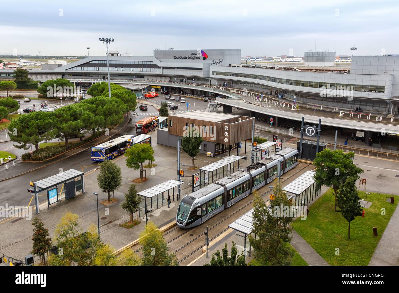 Toulouse, France - September 21, 2021: Modern light rail tram model Alstom Citadis public transport transit at Blagnac airport in Toulouse, France. Stock Photo