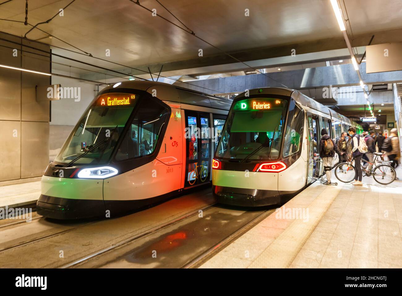Strasbourg, France - October 29, 2021: Modern light rail trams model Alstom Citadis public transport transit transportation underground station Gare C Stock Photo