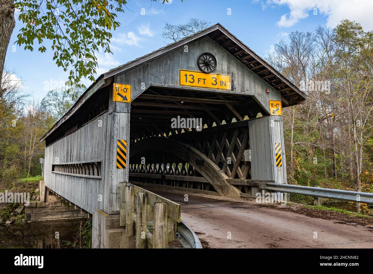 The Doyle Road Covered Bridge crosses Mill Creek during the Autumn leaf color change in