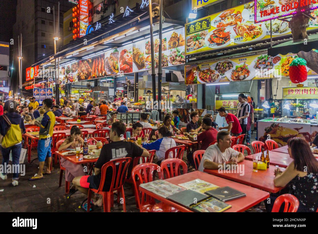 KUALA LUMPUR, MALAYSIA MARCH 23, 2018 People eat at Jalan Alor food street in Kuala Lumpur