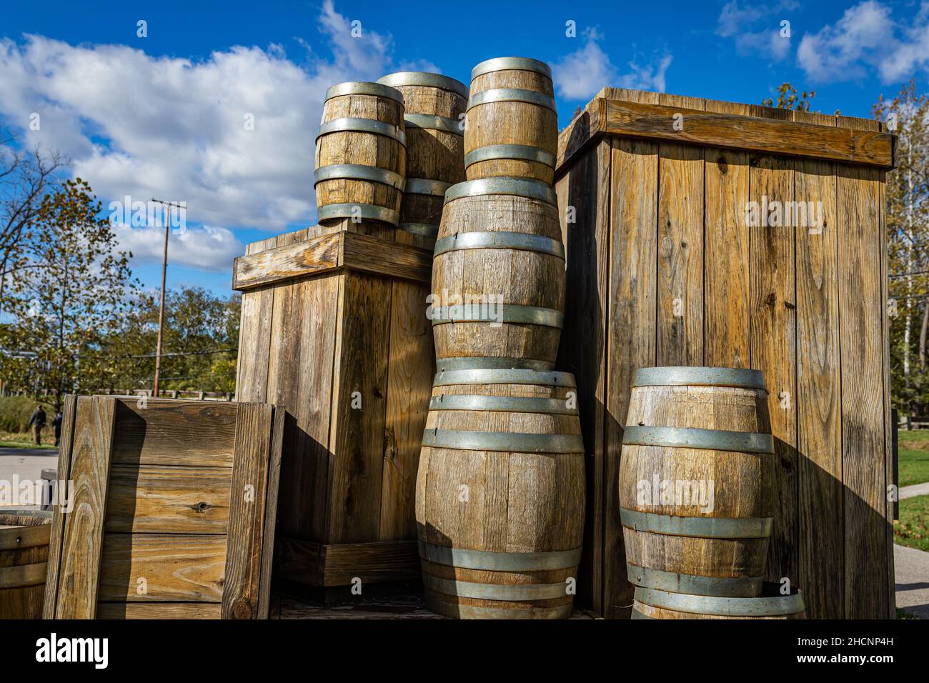 Vintage shipping containers, barrels and crates, awaiting loading for