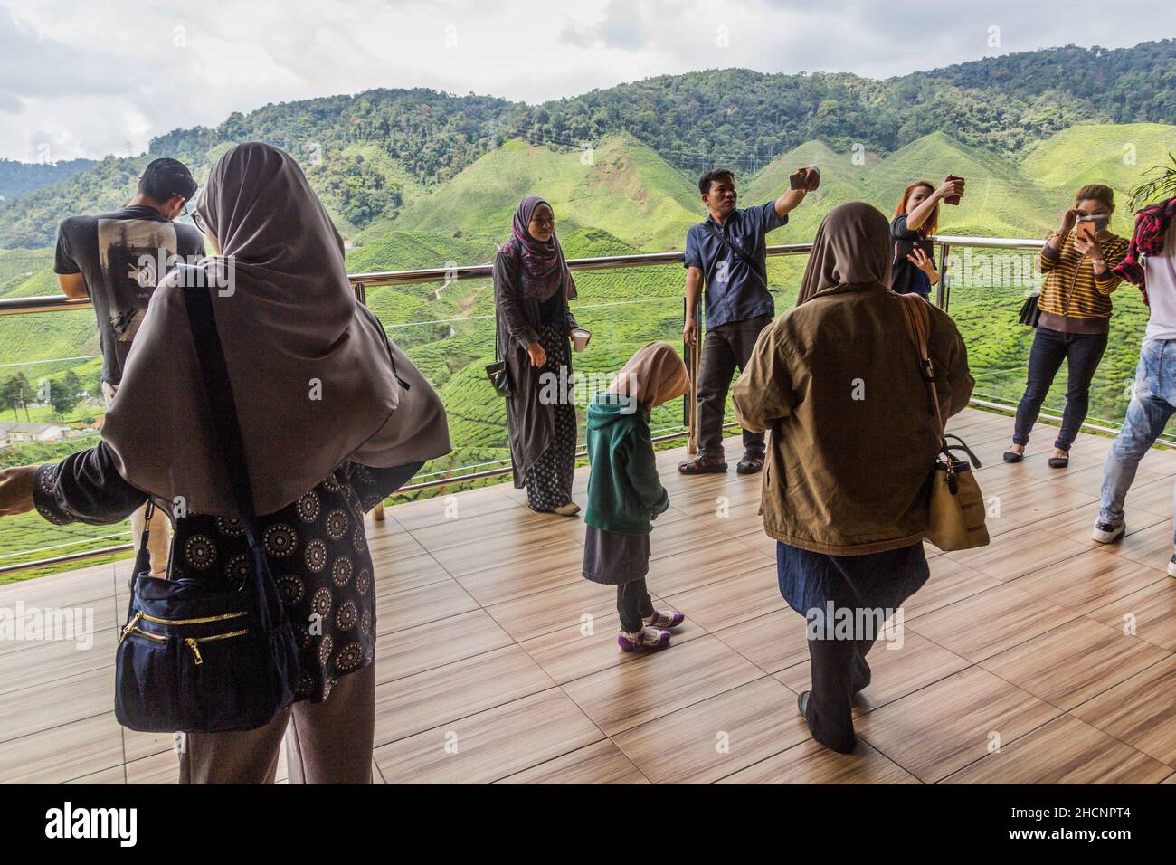 CAMERON HIGHLANDS, MALAYSIA - MARCH 27, 2018: People at the terrace of Cameron Valley Tea House. Stock Photo