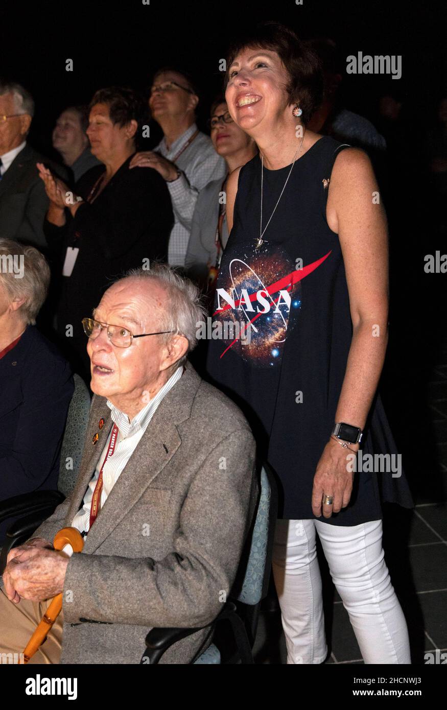 Usa. 12th Aug, 2018. Dr. EUGENE PARKER (seated in the foreground), a pioneer in heliophysics and S. Chandrasekhar distinguished service professor emeritus for the Department of Astronomy and Astrophysics at the University of Chicago, watches the launch of NASA's Parker Solar Probe. This is the first agency mission named for a living person. Standing behind Parker is Nicky Fox, Parker Solar Probe project scientist at Johns Hopkins Applied Physics Laboratory. The liftoff took place at 3:31 a.m. EDT on Sunday, Aug. 12, 2018. The spacecraft was built by the Johns Hopkins University Applied Phys Stock Photo