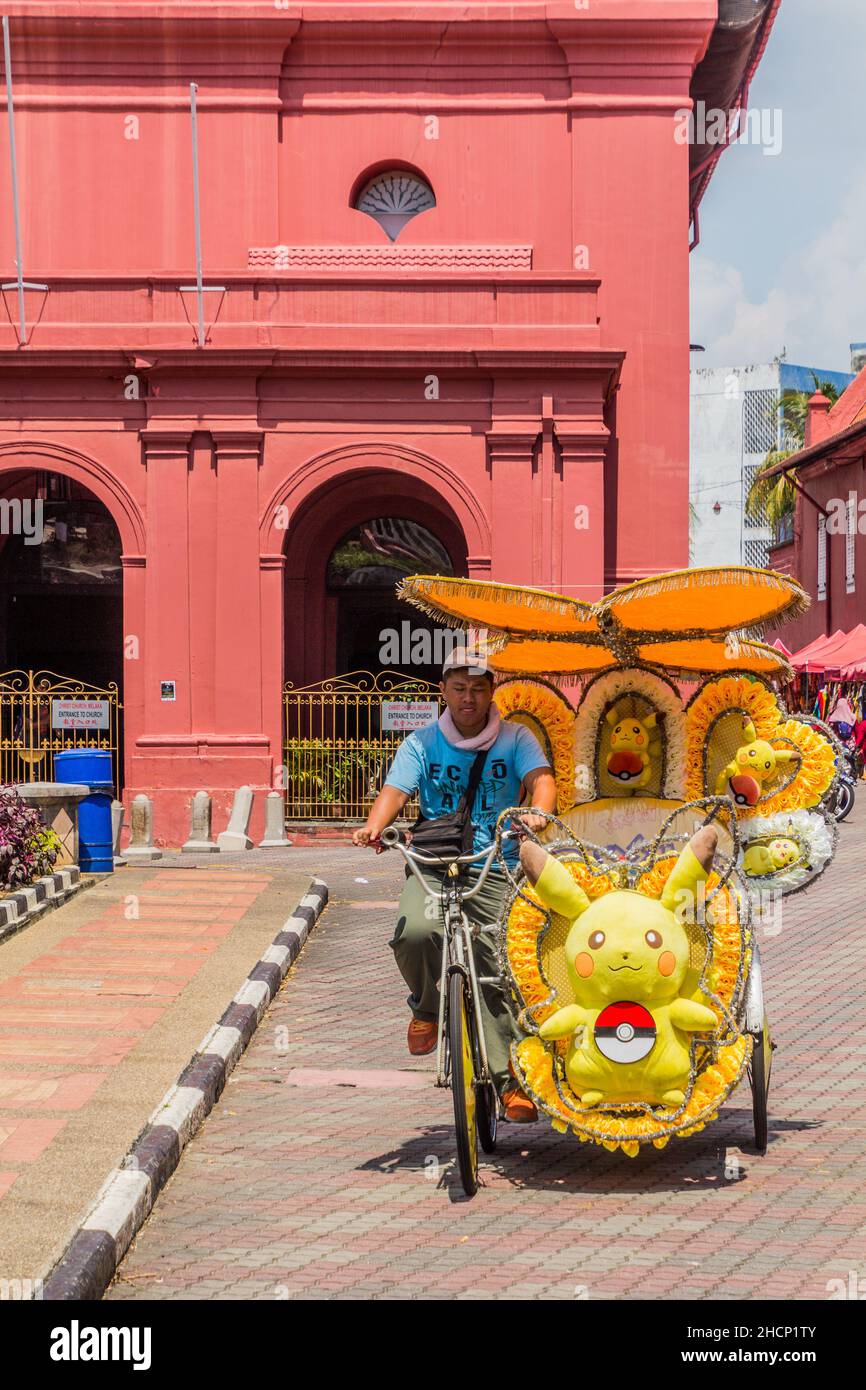 MALACCA, MALAYASIA - MARCH 19, 2018: Colorful rickshaw in the center of Malacca Melaka . Stock Photo
