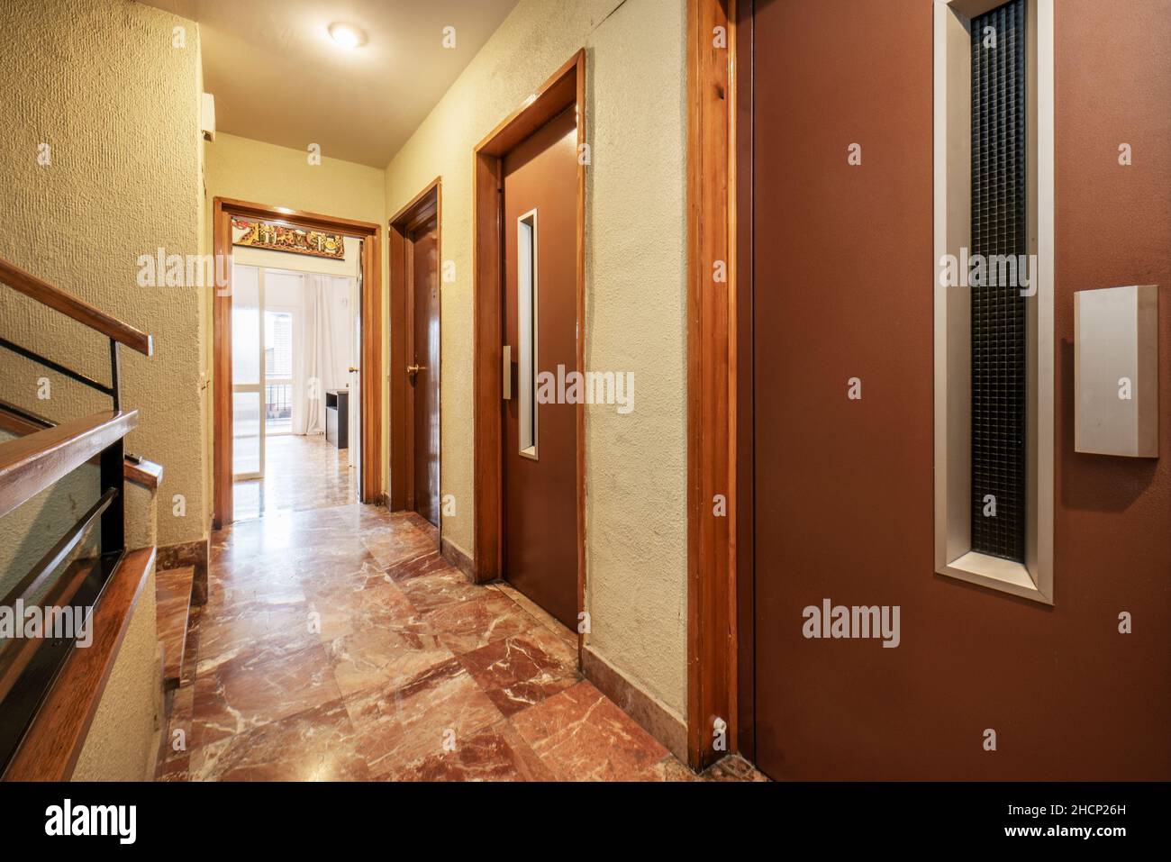 Landing in a residential building with stairs and elevator Stock Photo