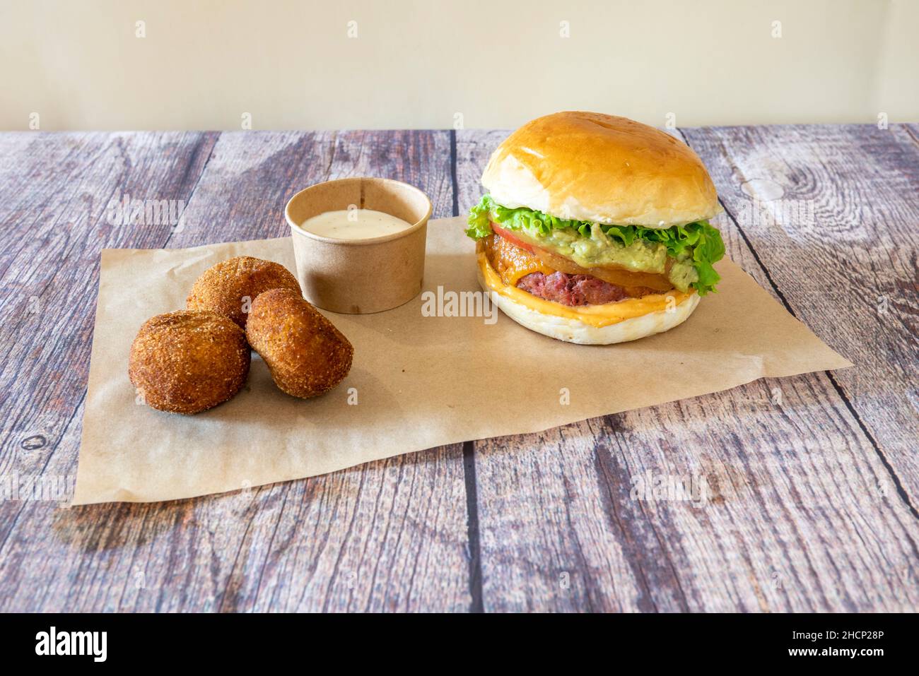 Hamburger menu with ham croquettes for starter Stock Photo Alamy