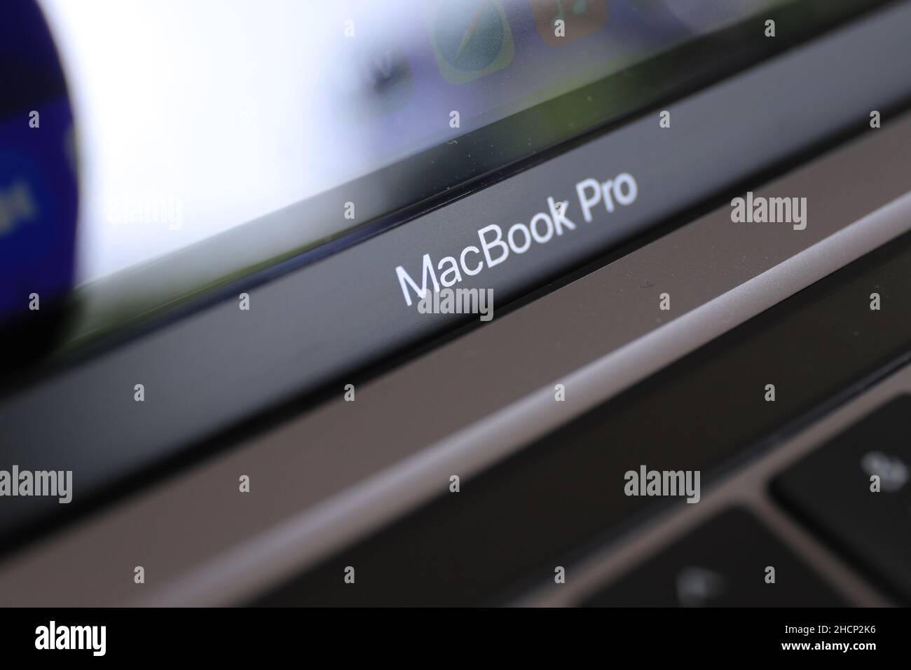 Surabaya, Indonesia - December 15, 2021 : Selective focus, close up of Macbook Pro writing on apple device Stock Photo