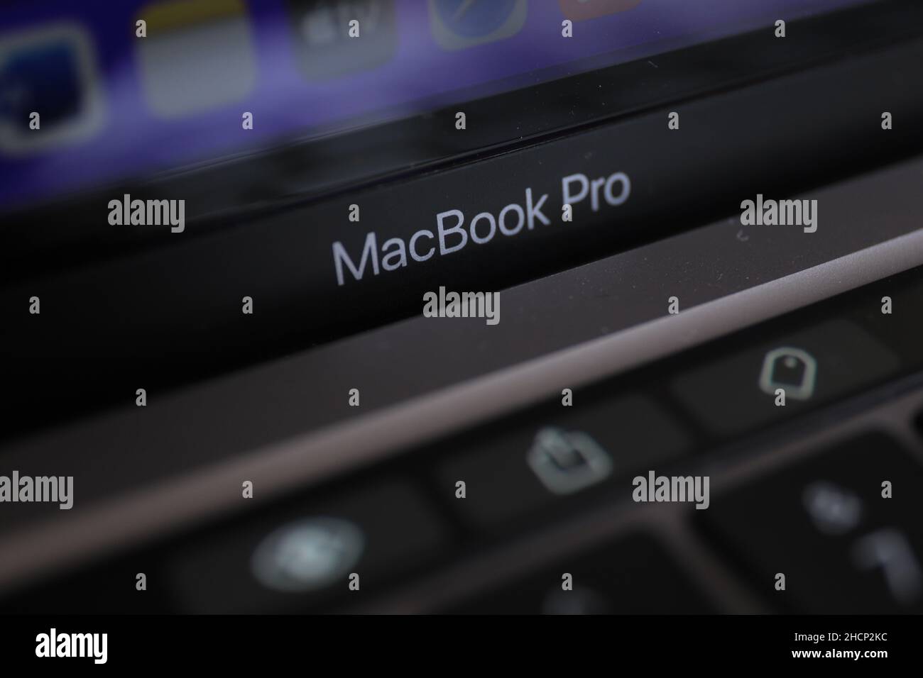 Surabaya, Indonesia - December 15, 2021 : Selective focus, close up of Macbook Pro writing on apple device Stock Photo