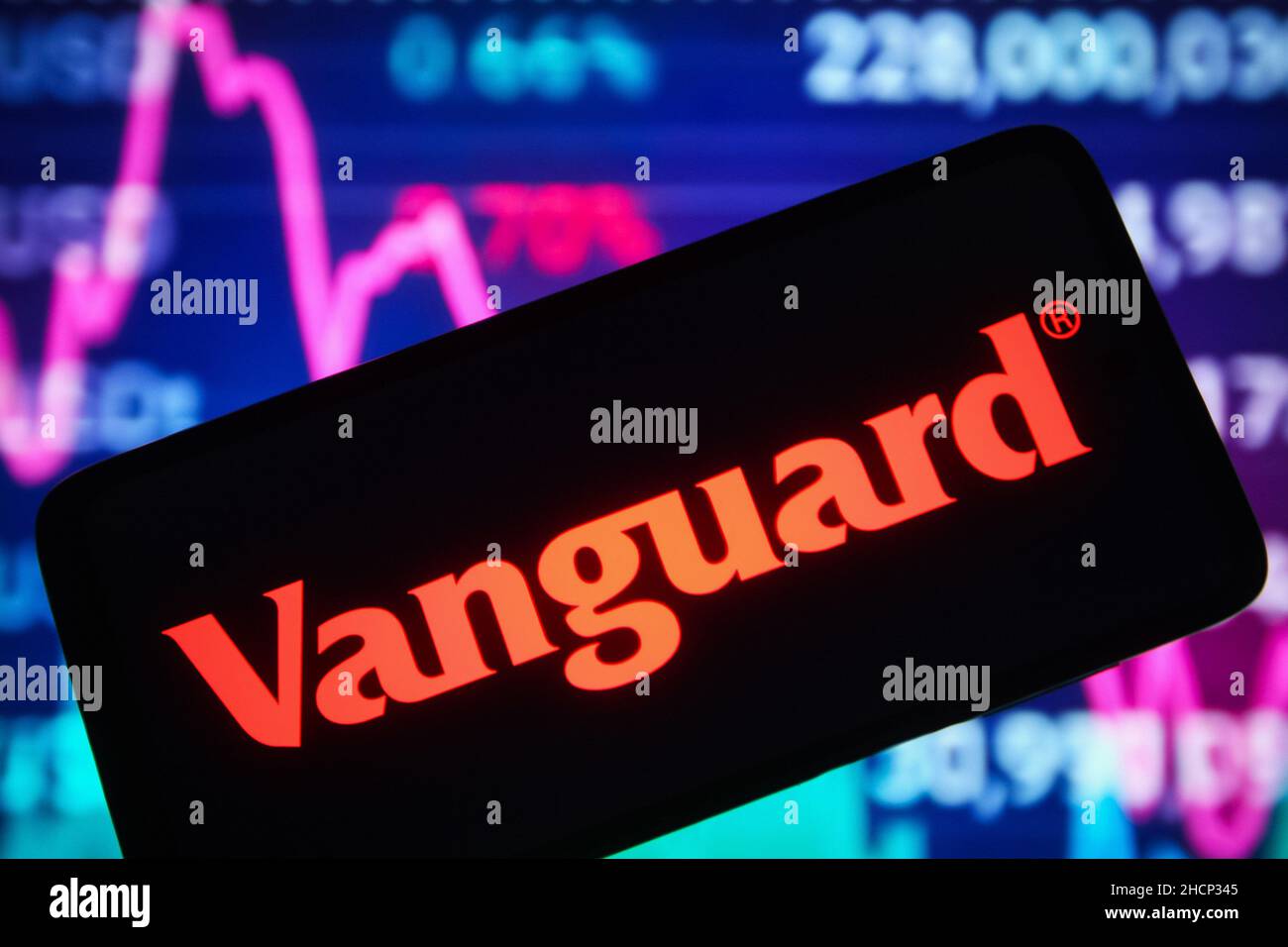 Ukraine. 30th Dec, 2021. In this photo illustration, The Vanguard Group Inc. logo is seen on a smartphone screen and a stock market info in the background. Credit: SOPA Images Limited/Alamy Live News Stock Photo